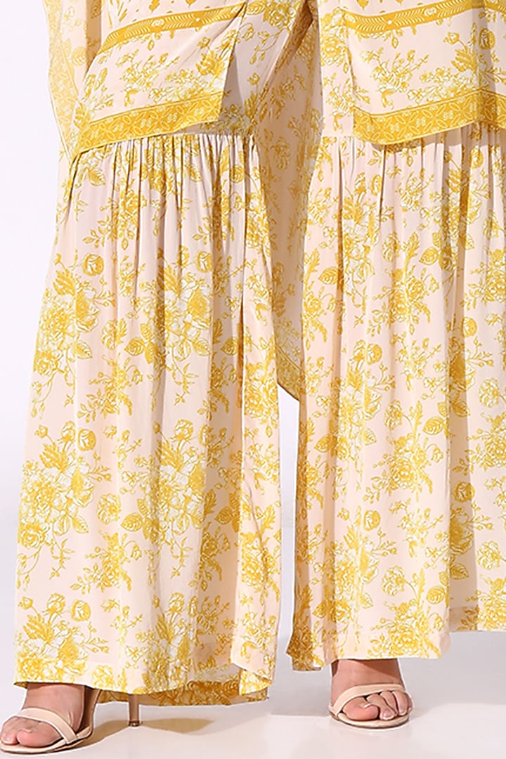Yellow Crepe Floral Printed & Lace Embellished Kaftan Set by Sakshi Girri at Pernia's Pop Up Shop