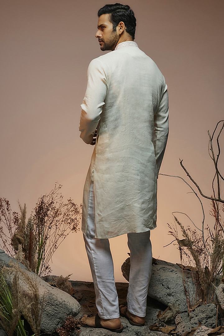 Off-White Linen Resham Hand Embroidered Handcrafted Kurta by SAMMOHAN at Pernia's Pop Up Shop