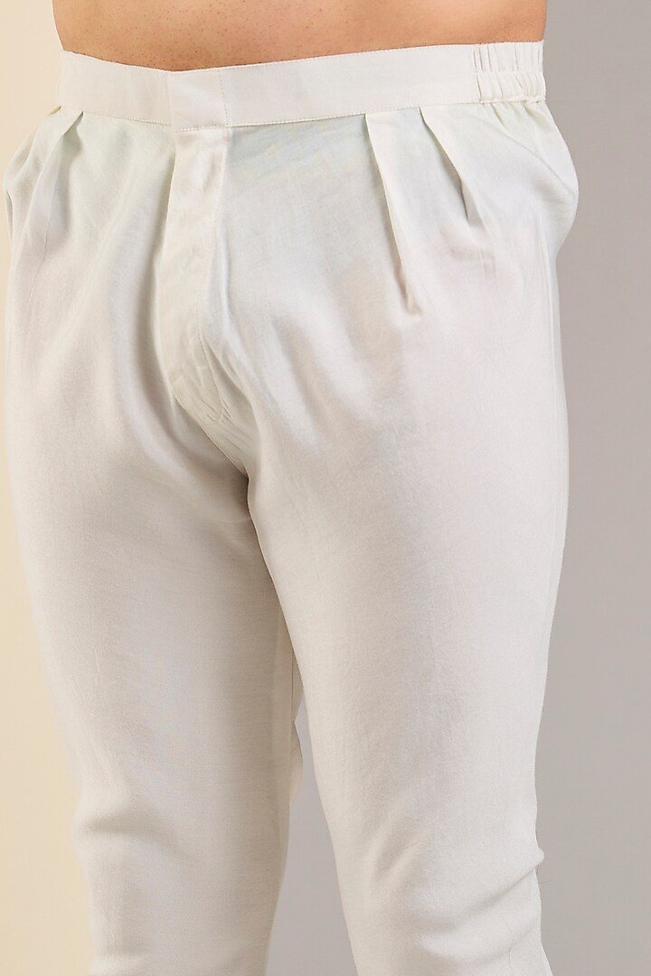 White Cotton Churidar Pants by SAMMOHAN at Pernia's Pop Up Shop