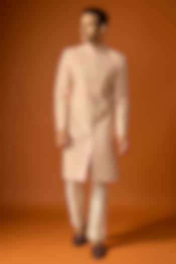 Orange Silk Embroidered Groom Sherwani Set by SAMMOHAN at Pernia's Pop Up Shop