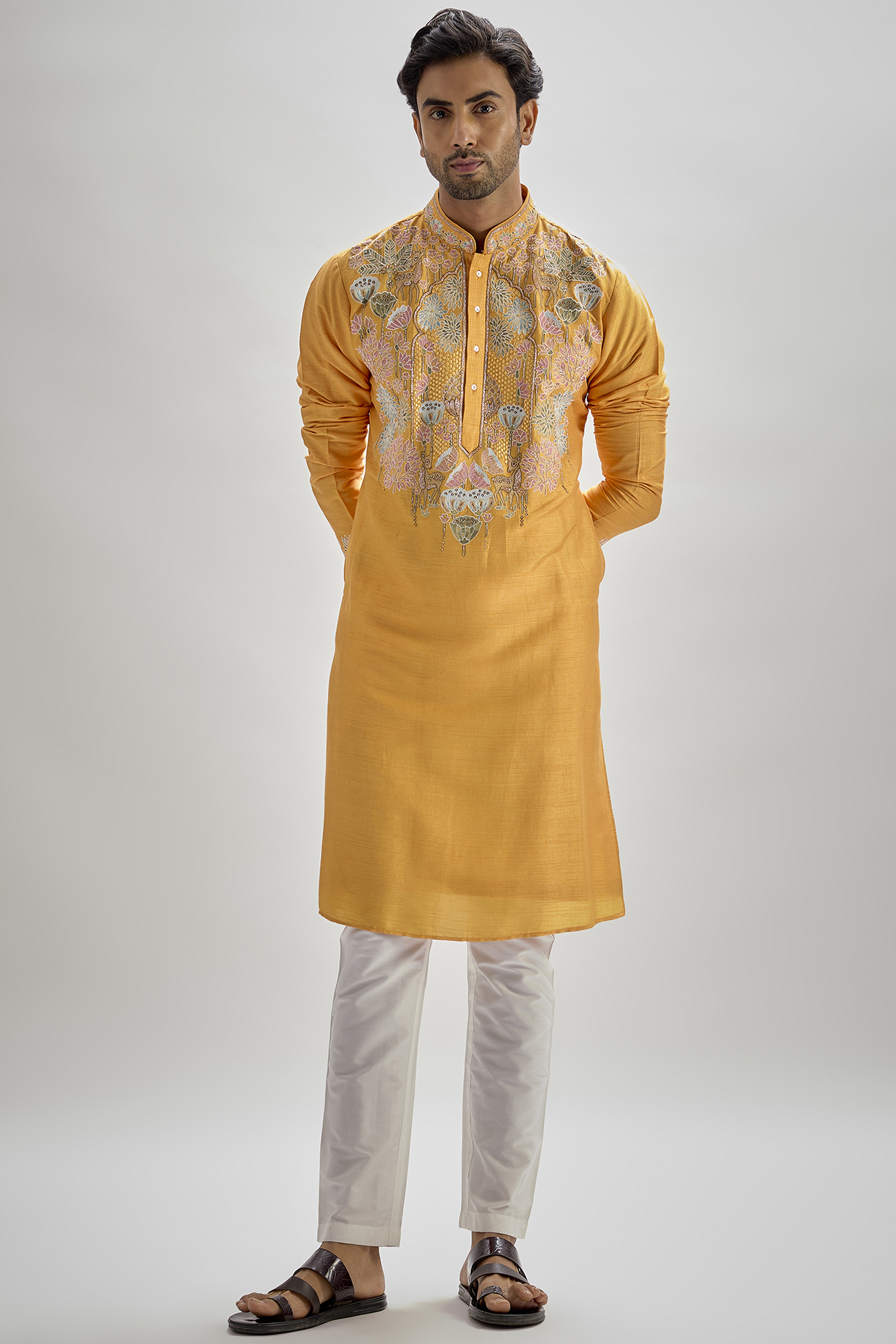 Orange Tussar Hand & Machine Embroidered Kurta Set by SAMMOHAN