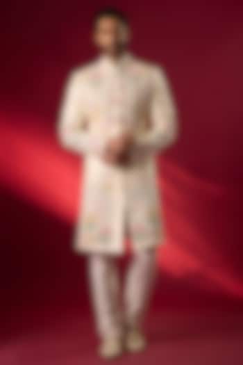Ivory Raw Silk Hand & Machine Embroidered Groom Sherwani Set by SAMMOHAN at Pernia's Pop Up Shop