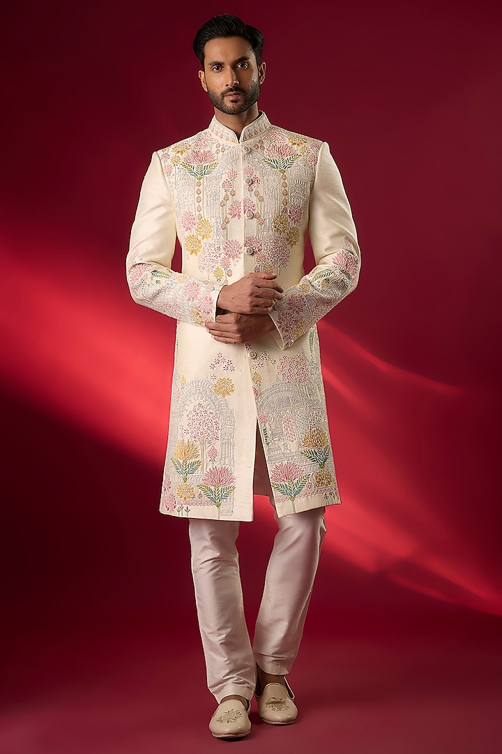 Ivory Raw Silk Hand & Machine Embroidered Groom Sherwani Set by SAMMOHAN at Pernia's Pop Up Shop