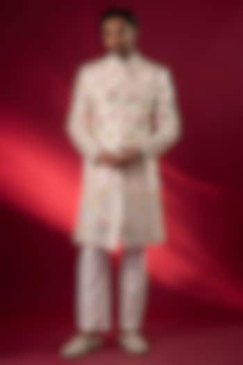 Ivory Raw Silk Hand & Machine Embroidered Groom Sherwani Set by SAMMOHAN at Pernia's Pop Up Shop