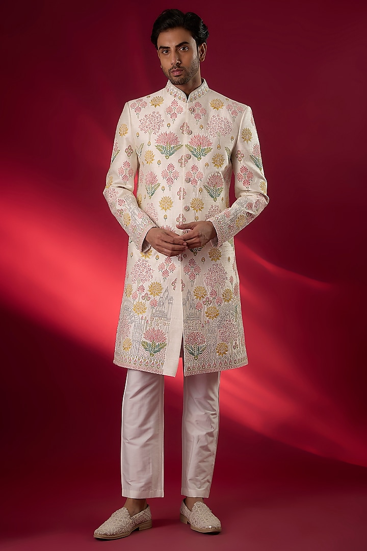 Ivory Raw Silk Hand & Machine Embroidered Groom Sherwani Set by SAMMOHAN at Pernia's Pop Up Shop