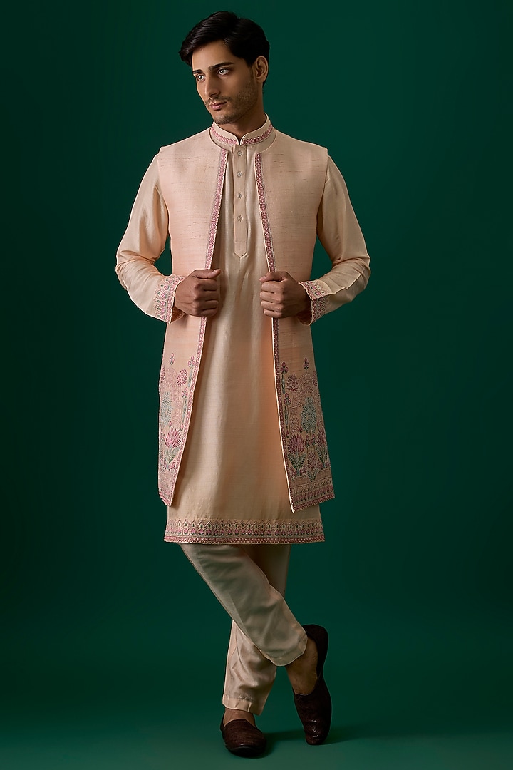 Peach Raw Silk Hand & Machine Embroidered Indowestern Set by SAMMOHAN