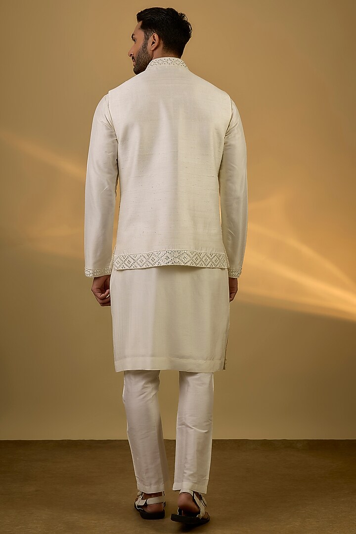 Off-White Raw Silk Mirror Embroidered Bundi Jacket Set by SAMMOHAN at Pernia's Pop Up Shop