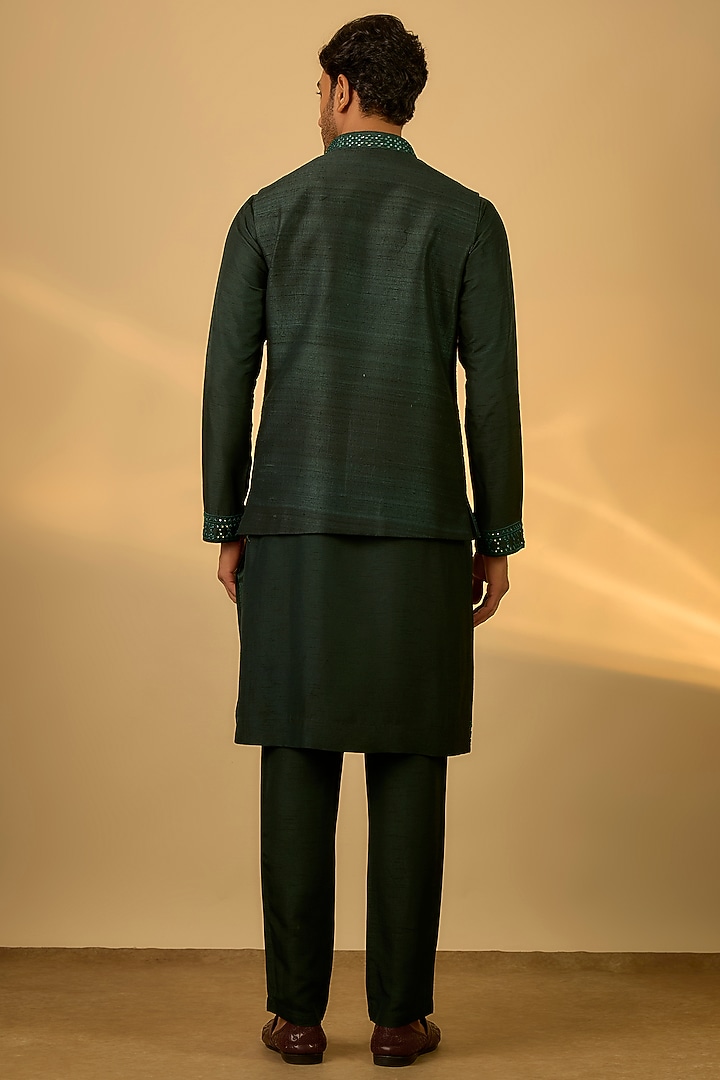 Emerald Green Raw Silk Mirror Embroidered Bundi Jacket Set by SAMMOHAN at Pernia's Pop Up Shop