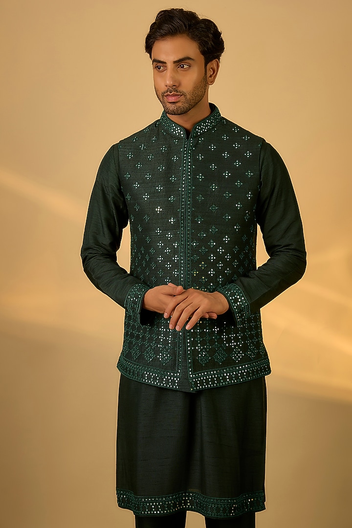 Emerald Green Raw Silk Mirror Embroidered Bundi Jacket Set by SAMMOHAN at Pernia's Pop Up Shop