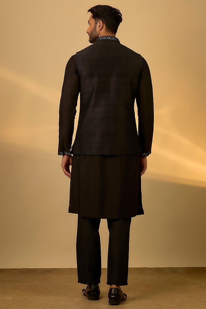 Black Raw Silk Mirror Embroidered Bundi Jacket Set by SAMMOHAN at Pernia's Pop Up Shop