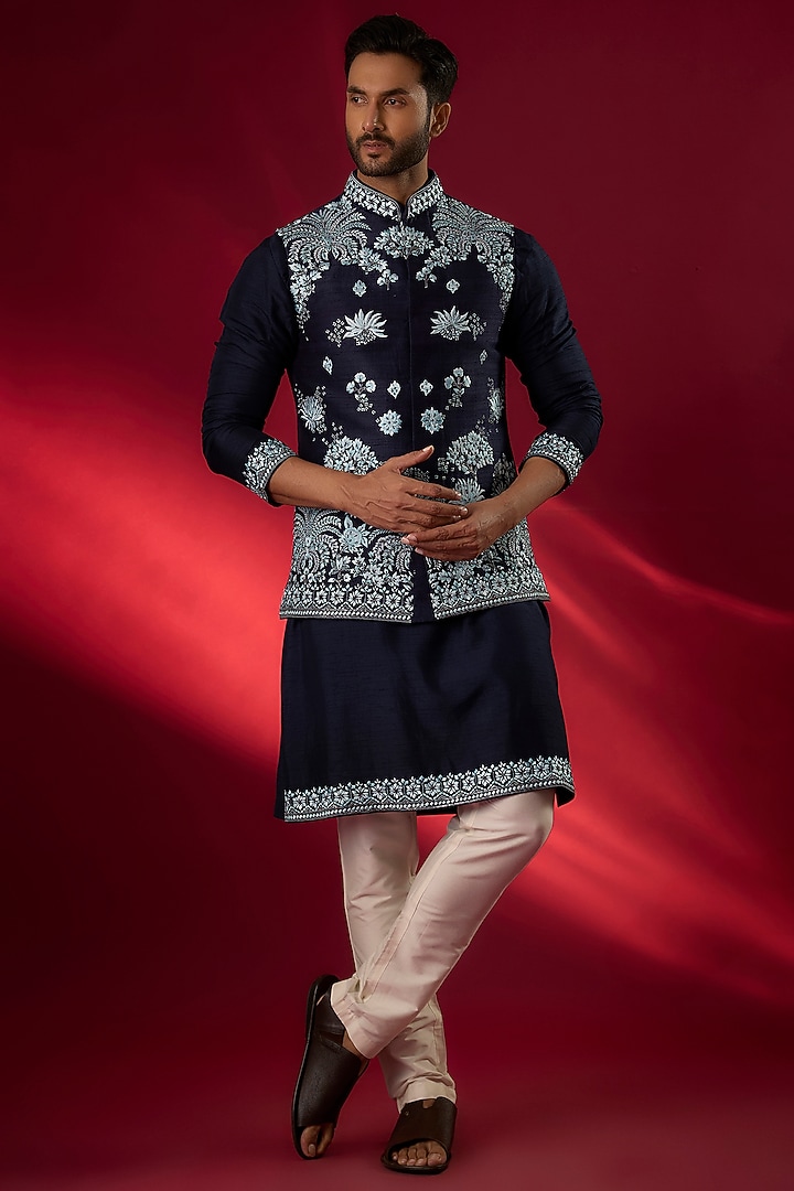 Navy Blue Raw Silk Hand & Machine Embroidered Bundi Jacket Set by SAMMOHAN at Pernia's Pop Up Shop