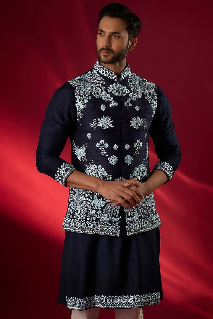 Navy Blue Raw Silk Hand & Machine Embroidered Bundi Jacket Set by SAMMOHAN at Pernia's Pop Up Shop