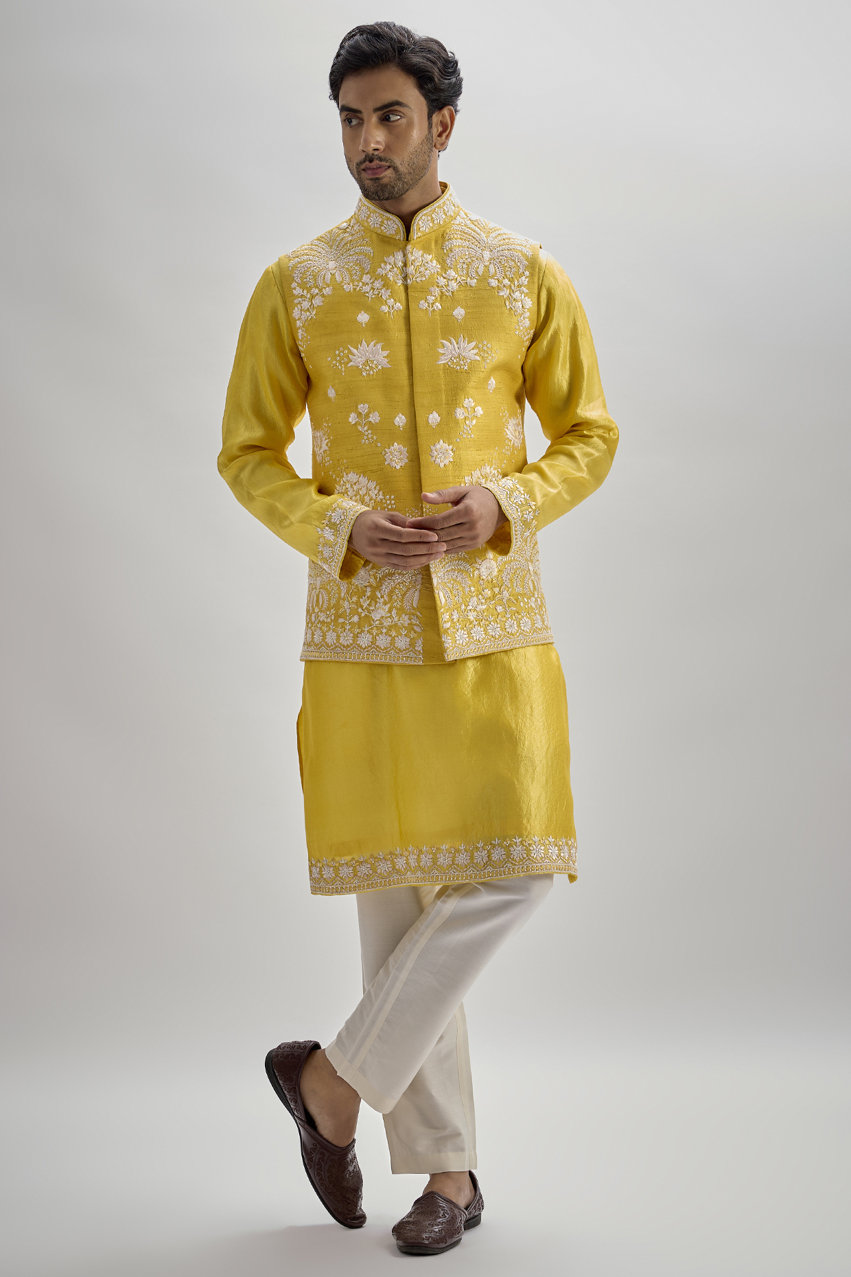 Yellow Raw Silk Hand & Machine Embroidered Bundi Jacket Set by SAMMOHAN