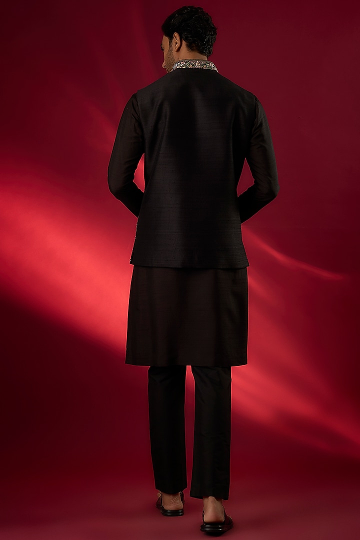 Black Raw Silk Hand & Machine Embroidered Bundi Jacket Set by SAMMOHAN at Pernia's Pop Up Shop