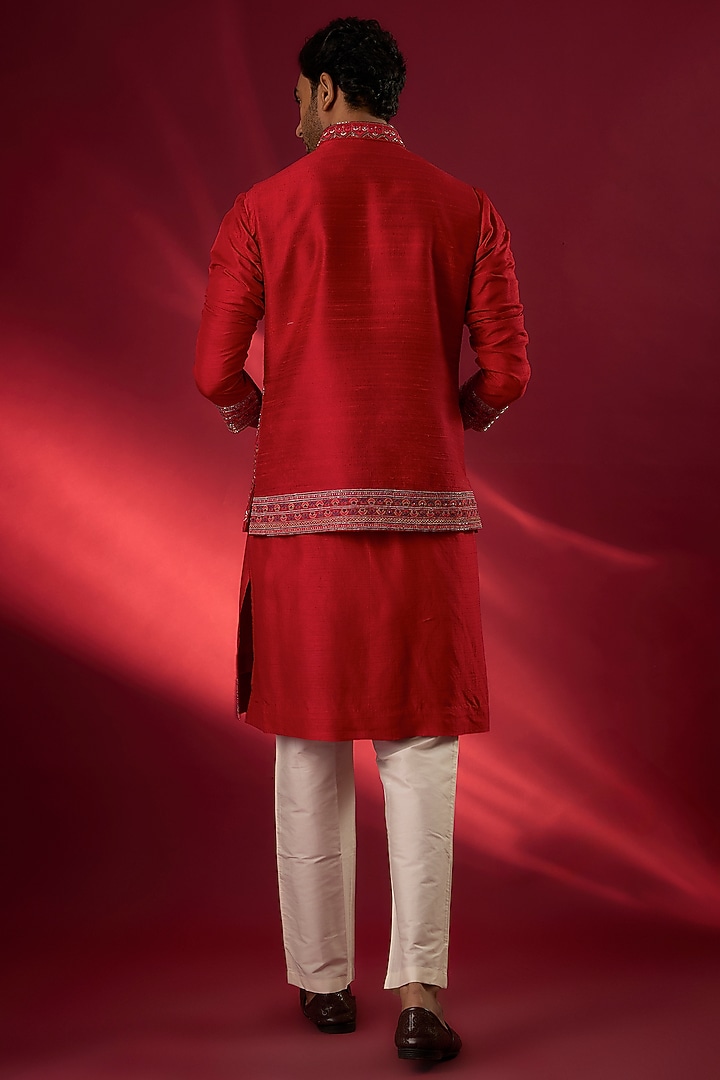 Red Raw Silk Hand & Machine Embroidered Bundi Jacket Set by SAMMOHAN at Pernia's Pop Up Shop
