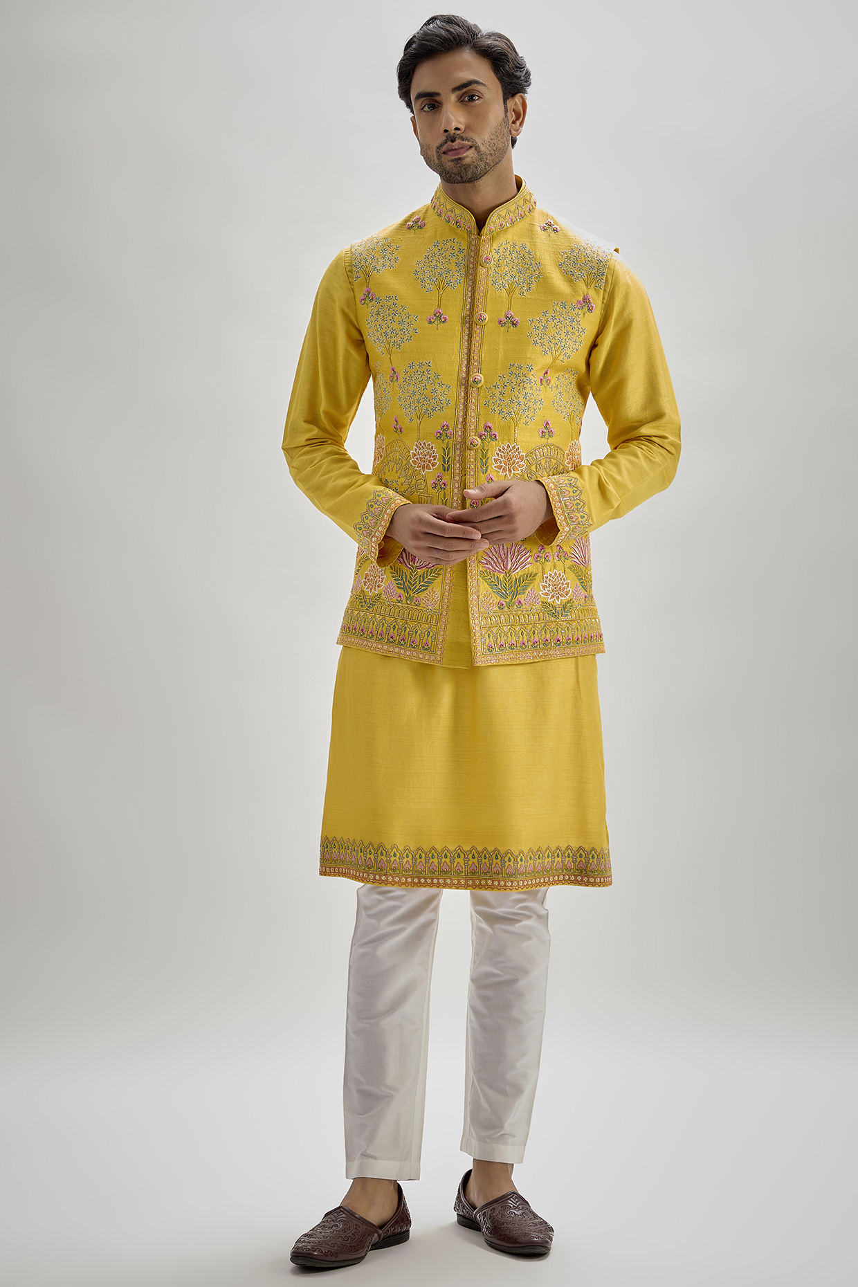 Yellow Raw Silk Hand & Machine Embroidered Bundi Jacket Set by SAMMOHAN