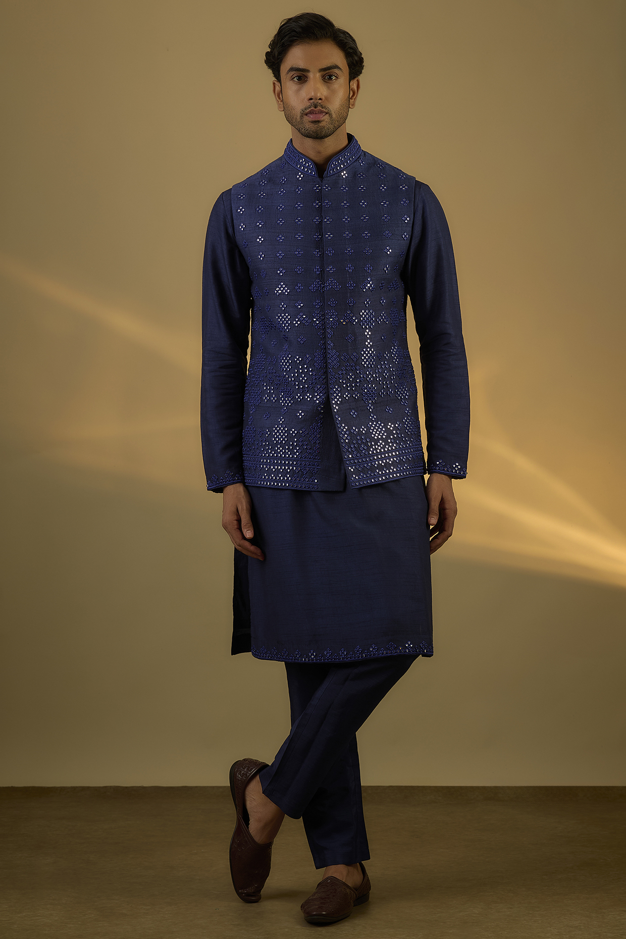 Navy Blue Raw Silk Hand & Machine Embroidered Bundi Jacket Set by SAMMOHAN