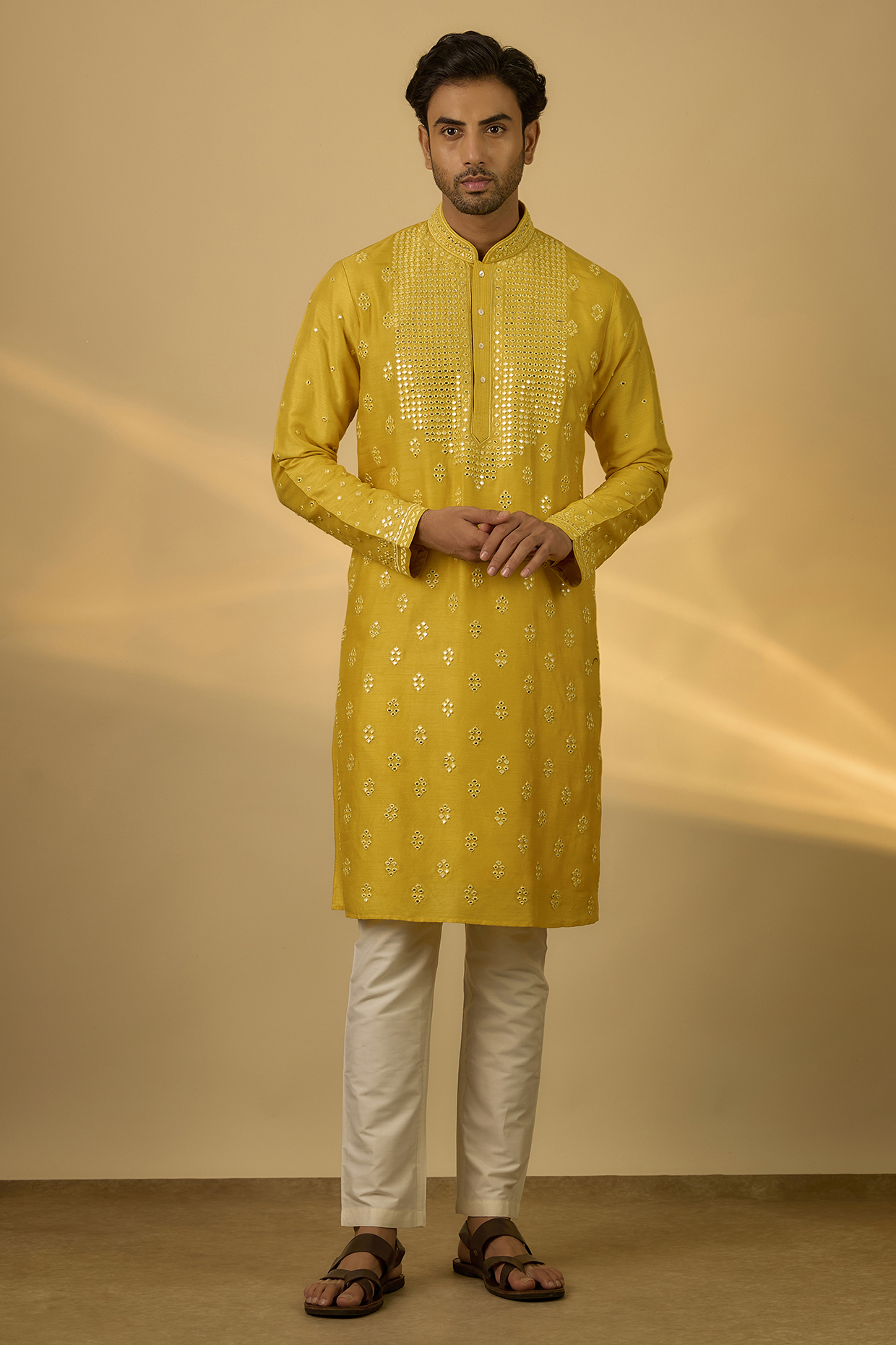 Yellow Tussar Mirror Hand & Machine Embroidered Kurta Set by SAMMOHAN
