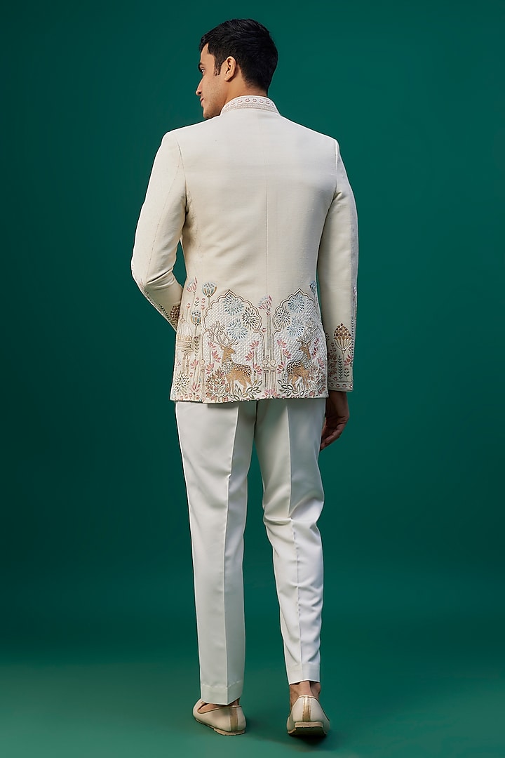 Off-White Raw Silk Resham Hand & Machine Embroidered Groom Bandhgala Set by SAMMOHAN at Pernia's Pop Up Shop