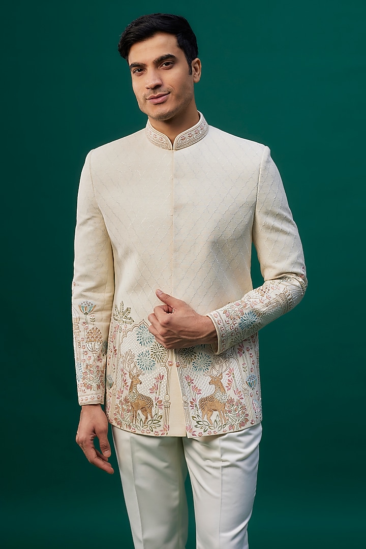 Off-White Raw Silk Resham Hand & Machine Embroidered Groom Bandhgala Set by SAMMOHAN at Pernia's Pop Up Shop