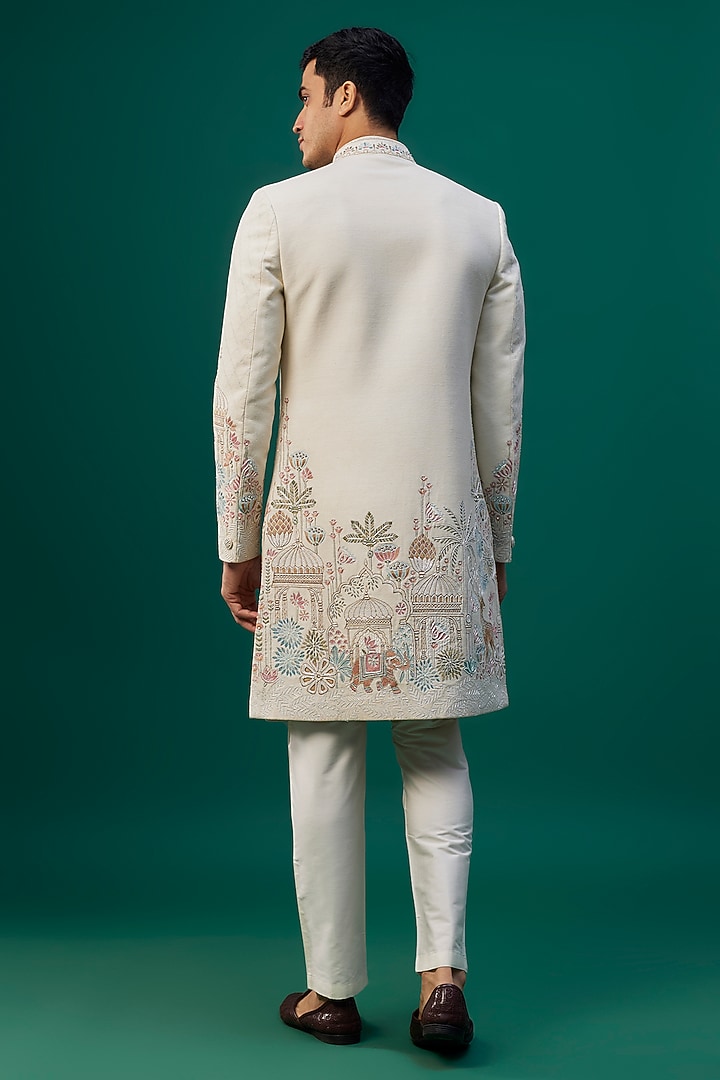 Ivory Raw Silk Resham Hand & Machine Embroidered Groom Sherwani Set by SAMMOHAN at Pernia's Pop Up Shop