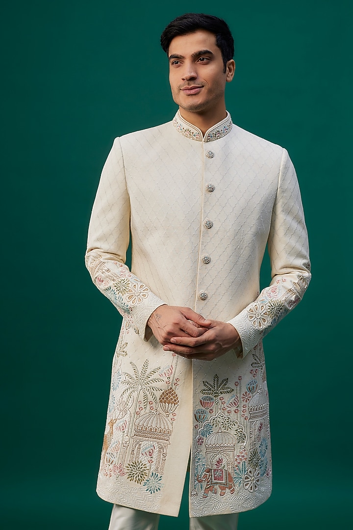 Ivory Raw Silk Resham Hand & Machine Embroidered Groom Sherwani Set by SAMMOHAN at Pernia's Pop Up Shop