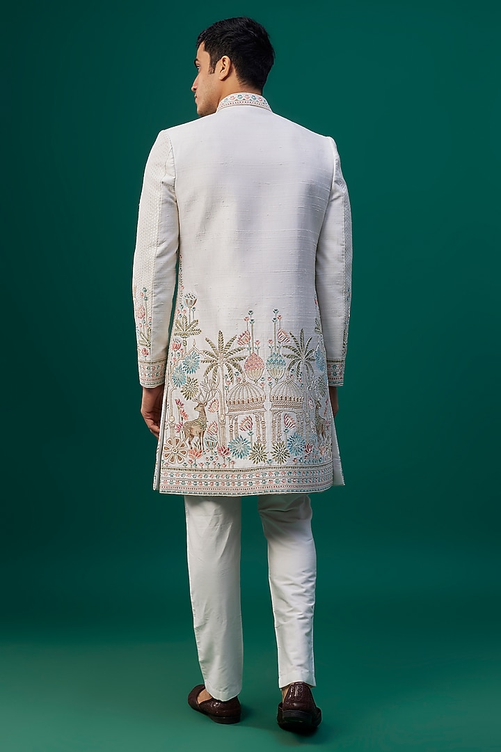 Ivory Raw Silk Resham Hand & Machine Embroidered Groom Sherwani Set by SAMMOHAN at Pernia's Pop Up Shop