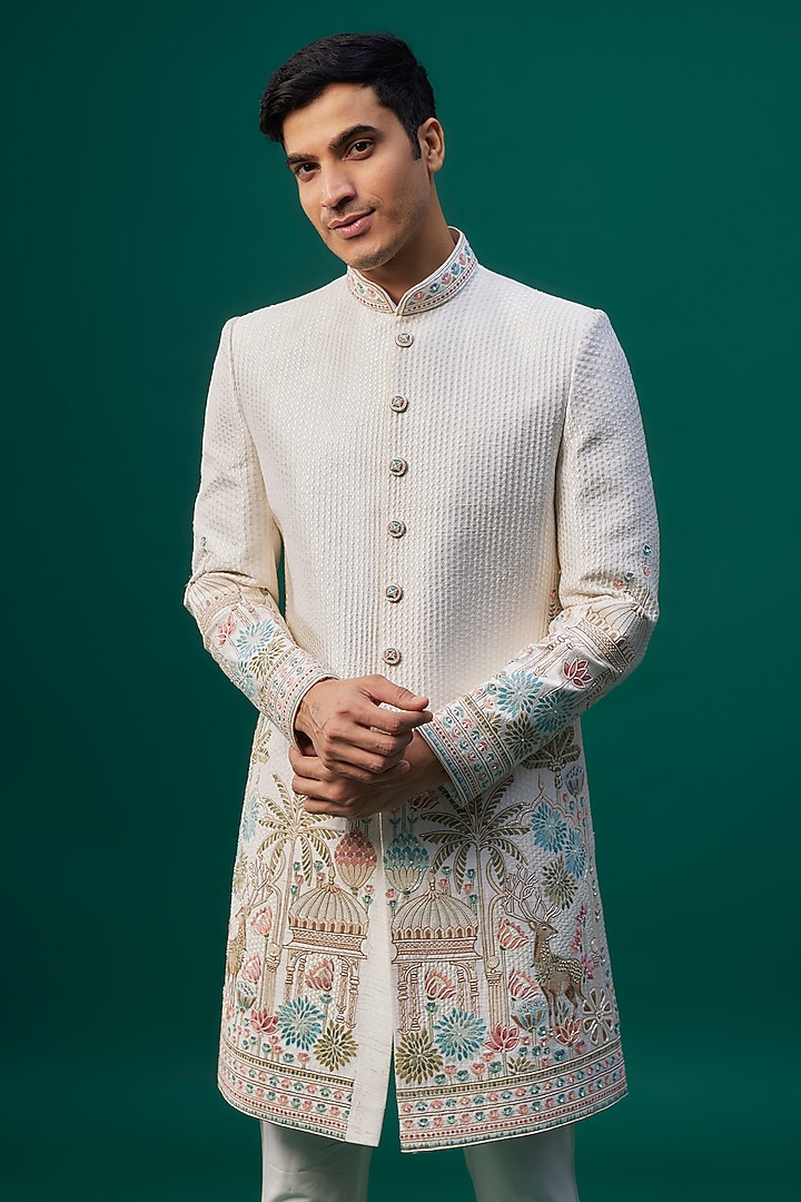 Ivory Raw Silk Resham Hand & Machine Embroidered Groom Sherwani Set by SAMMOHAN at Pernia's Pop Up Shop