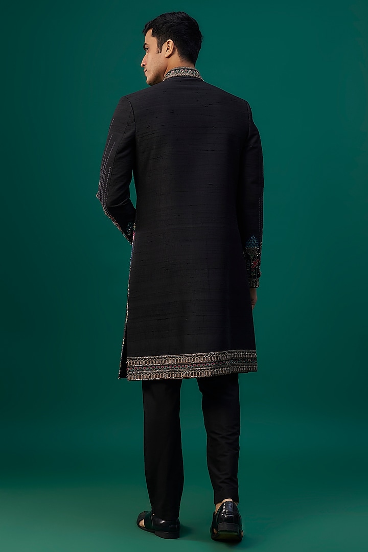 Black Raw Silk Resham Hand & Machine Embroidered Groom Indowestern Set by SAMMOHAN at Pernia's Pop Up Shop