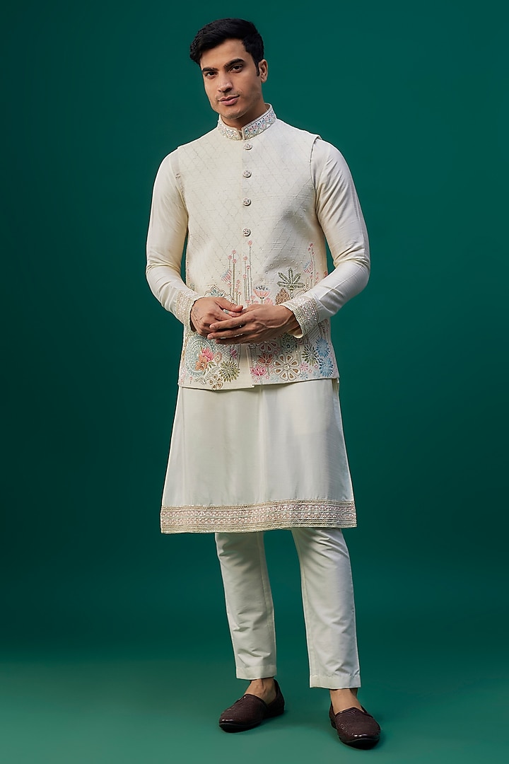 Ivory Raw Silk Resham Hand & Machine Embroidered Bundi Jacket Set by SAMMOHAN at Pernia's Pop Up Shop