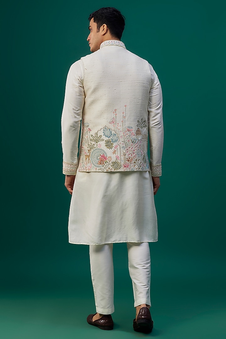 Ivory Raw Silk Resham Hand & Machine Embroidered Bundi Jacket Set by SAMMOHAN at Pernia's Pop Up Shop