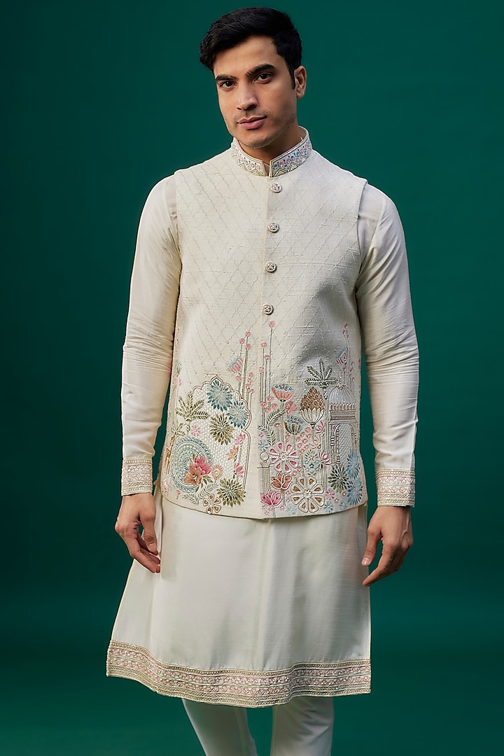 Ivory Raw Silk Resham Hand & Machine Embroidered Bundi Jacket Set by SAMMOHAN at Pernia's Pop Up Shop