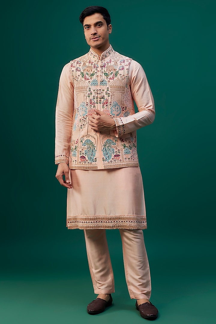 Peach Raw Silk Resham Hand & Machine Embroidered Bundi Jacket Set by SAMMOHAN