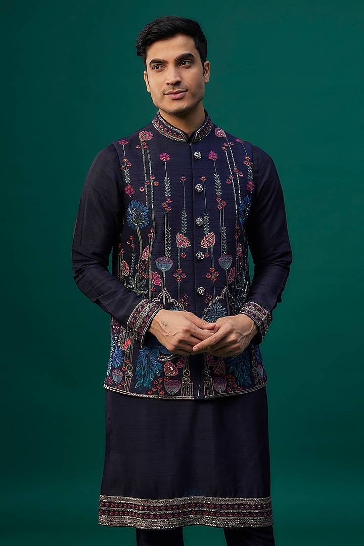 Navy Blue Raw Silk Resham Hand & Machine Embroidered Bundi Jacket Set by SAMMOHAN at Pernia's Pop Up Shop