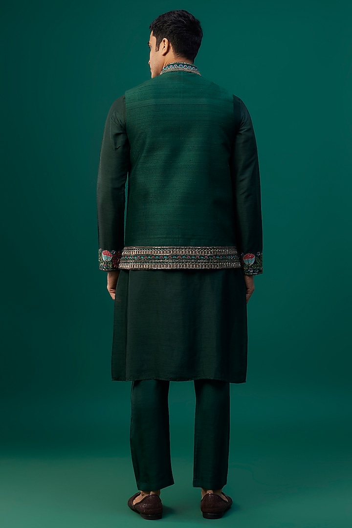 Emerald Green Raw Silk Resham Hand & Machine Embroidered Bundi Jacket Set by SAMMOHAN at Pernia's Pop Up Shop