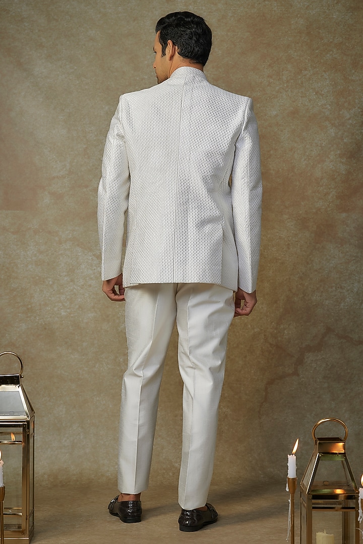 Ivory Raw Silk Hand & Machine Embroidered Bandhgala Set by SAMMOHAN at Pernia's Pop Up Shop