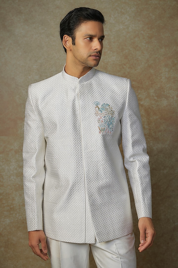 Ivory Raw Silk Hand & Machine Embroidered Bandhgala Set by SAMMOHAN at Pernia's Pop Up Shop