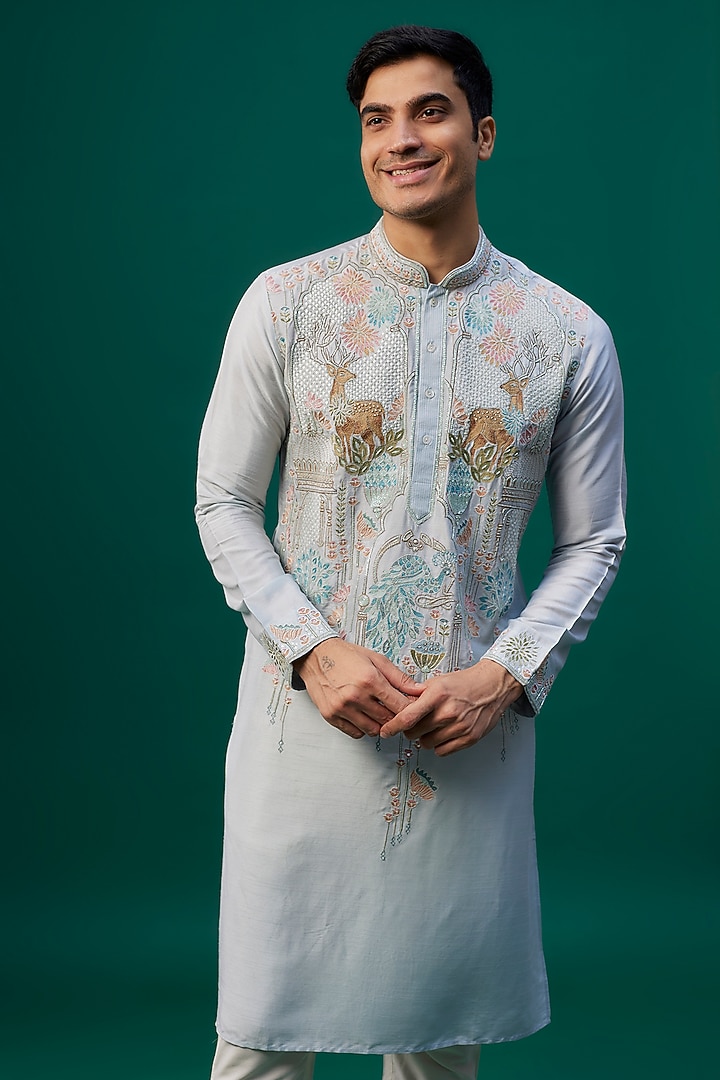 Powder Blue Tussar Resham Hand & Machine Embroidered Kurta Set by SAMMOHAN at Pernia's Pop Up Shop