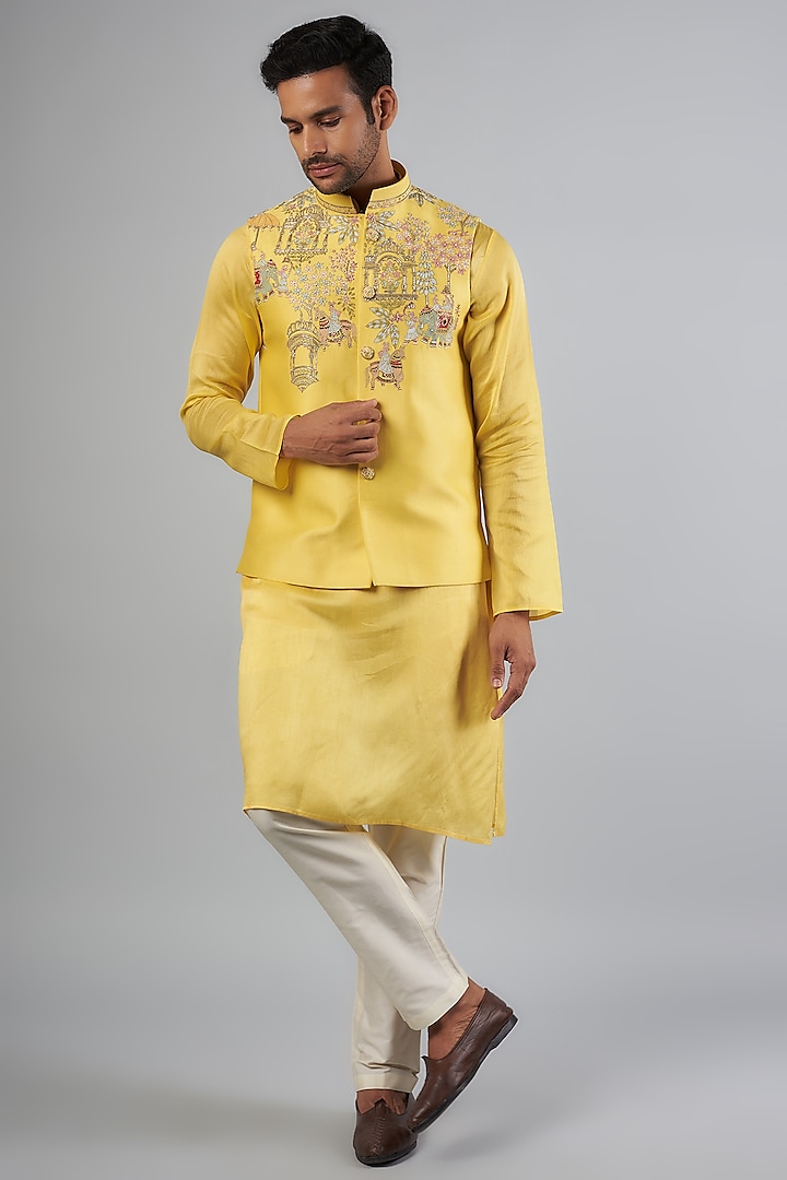 Yellow Tussar Thread Embroidered Bundi Jacket Set by SAMMOHAN