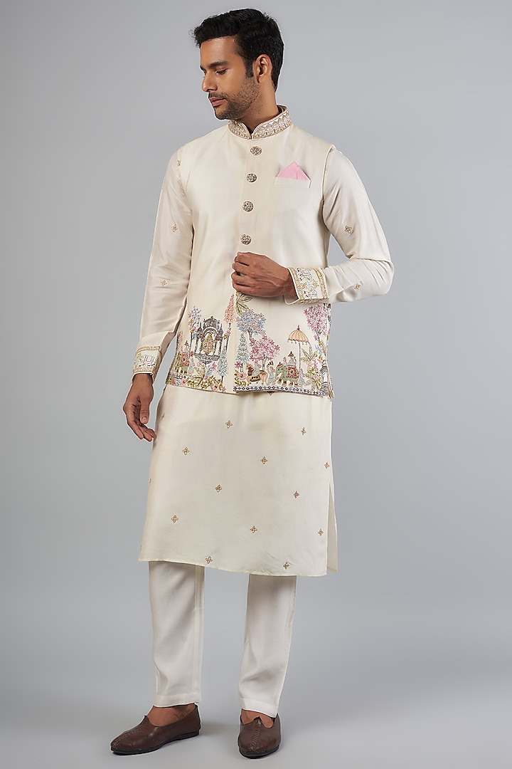 Ivory Tussar Thread Embroidered Bundi Jacket Set by SAMMOHAN