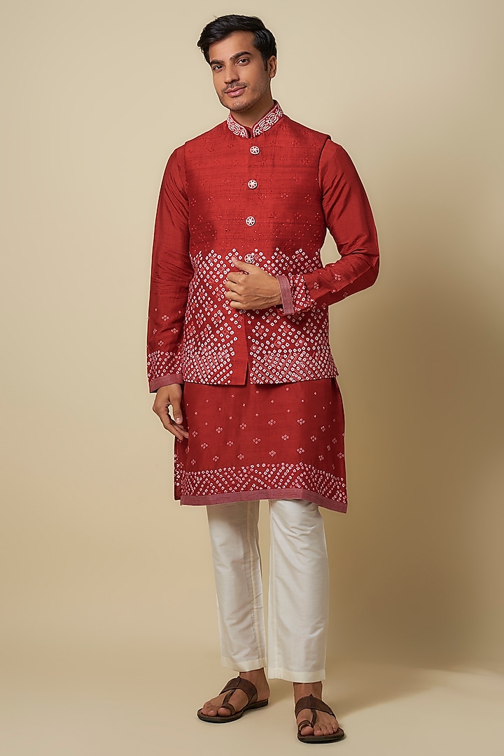 Red Bandhani Tussar Hand Embroidered Bundi Jacket Set by SAMMOHAN