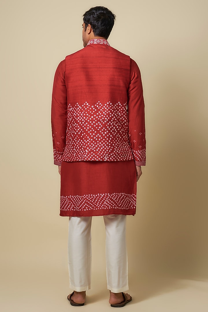 Red Bandhani Tussar Hand Embroidered Bundi Jacket Set by SAMMOHAN at Pernia's Pop Up Shop