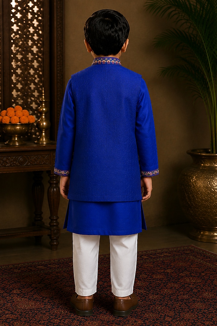 Blue Raw Silk Resham Embroidered Bundi Jacket Set For Boys by Sammohan Kids at Pernia's Pop Up Shop