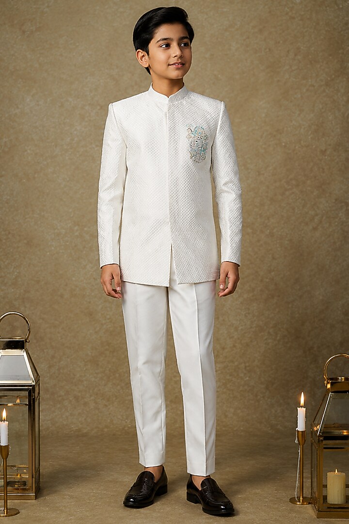 Ivory Tussar Hand Embroidered Bandhgala Set For Boys by Sammohan Kids at Pernia's Pop Up Shop