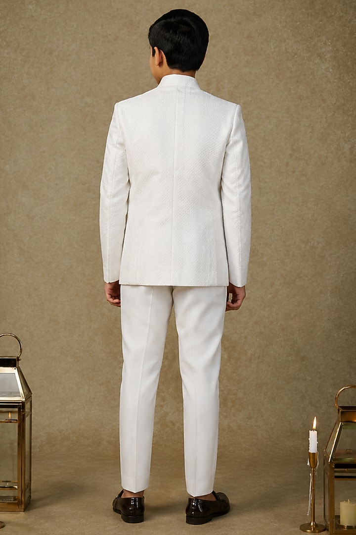 Ivory Tussar Hand Embroidered Bandhgala Set For Boys by Sammohan Kids at Pernia's Pop Up Shop