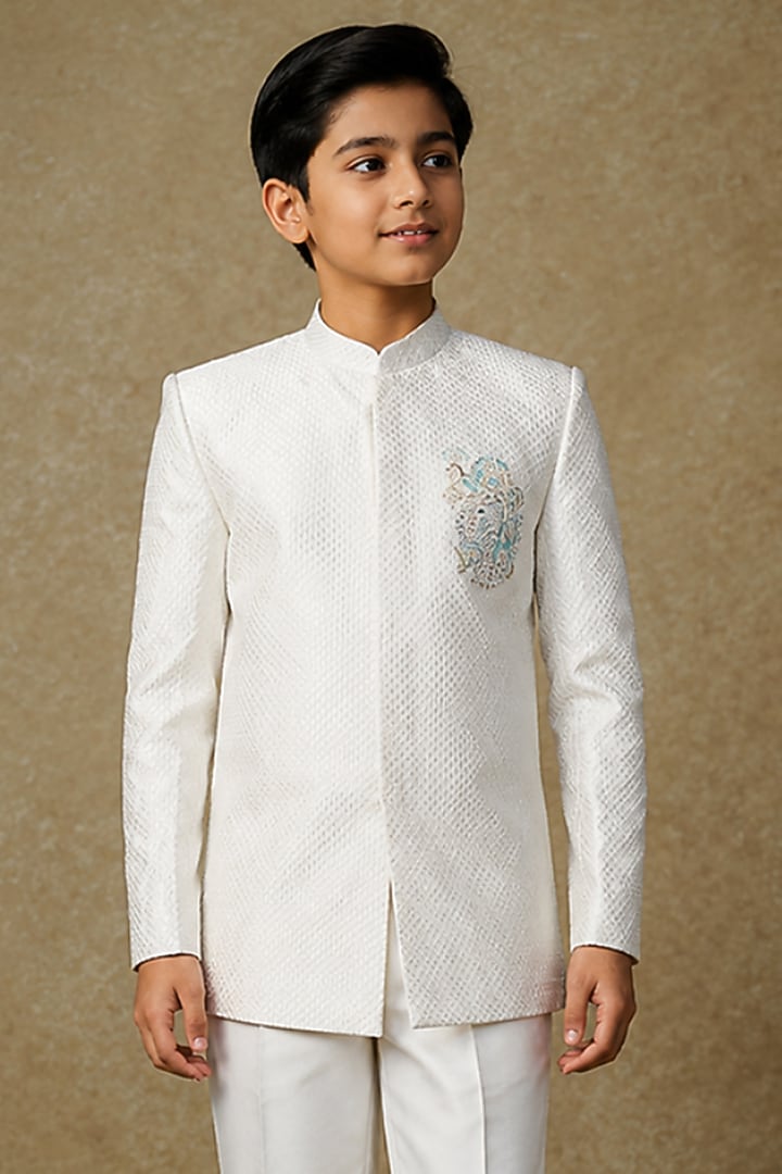 Ivory Tussar Hand Embroidered Bandhgala Set For Boys by Sammohan Kids at Pernia's Pop Up Shop