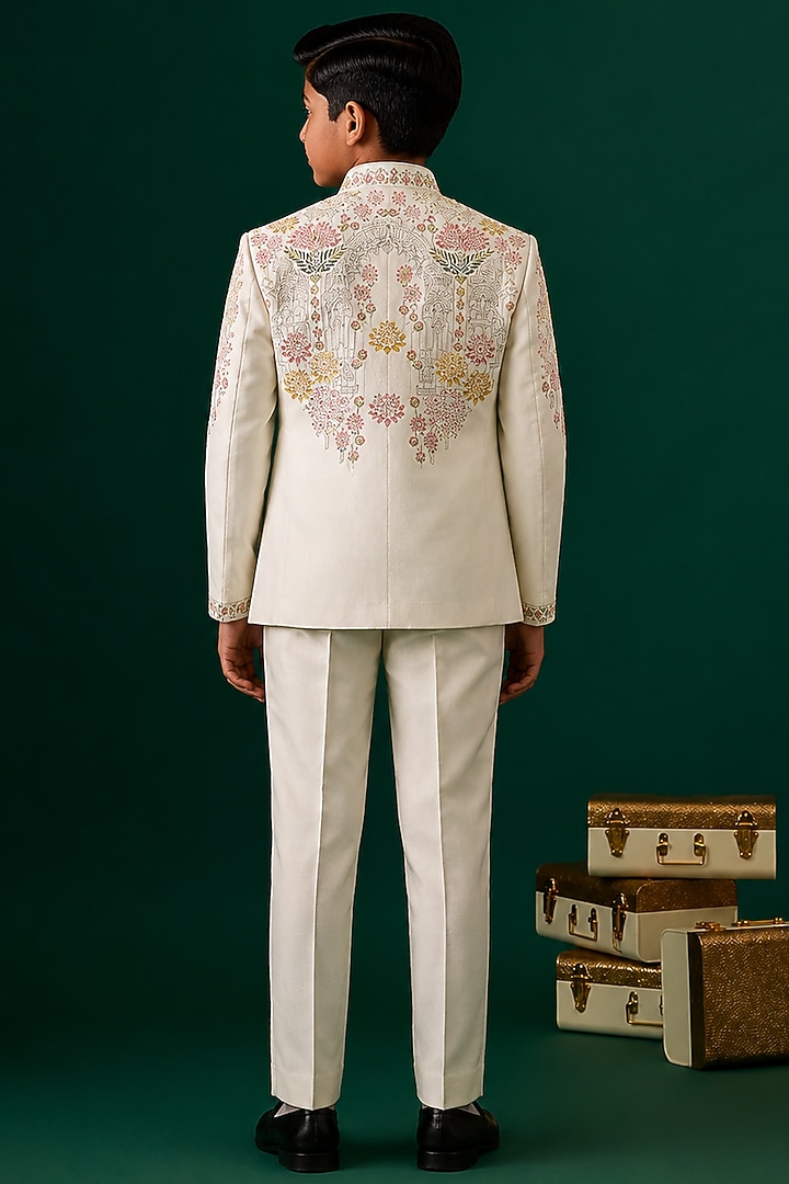 Ivory Tussar Embroidered Bandhgala Set For Boys by Sammohan Kids at Pernia's Pop Up Shop