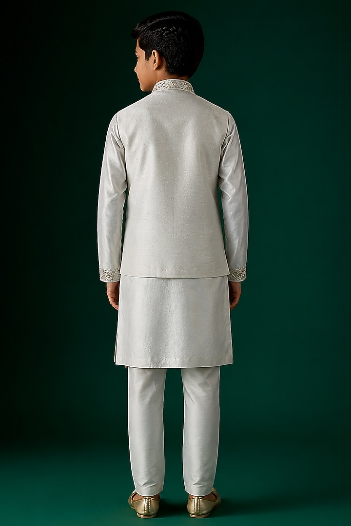 Ivory Tussar & Raw Silk Embroidered Bundi Jacket Set For Boys by Sammohan Kids at Pernia's Pop Up Shop