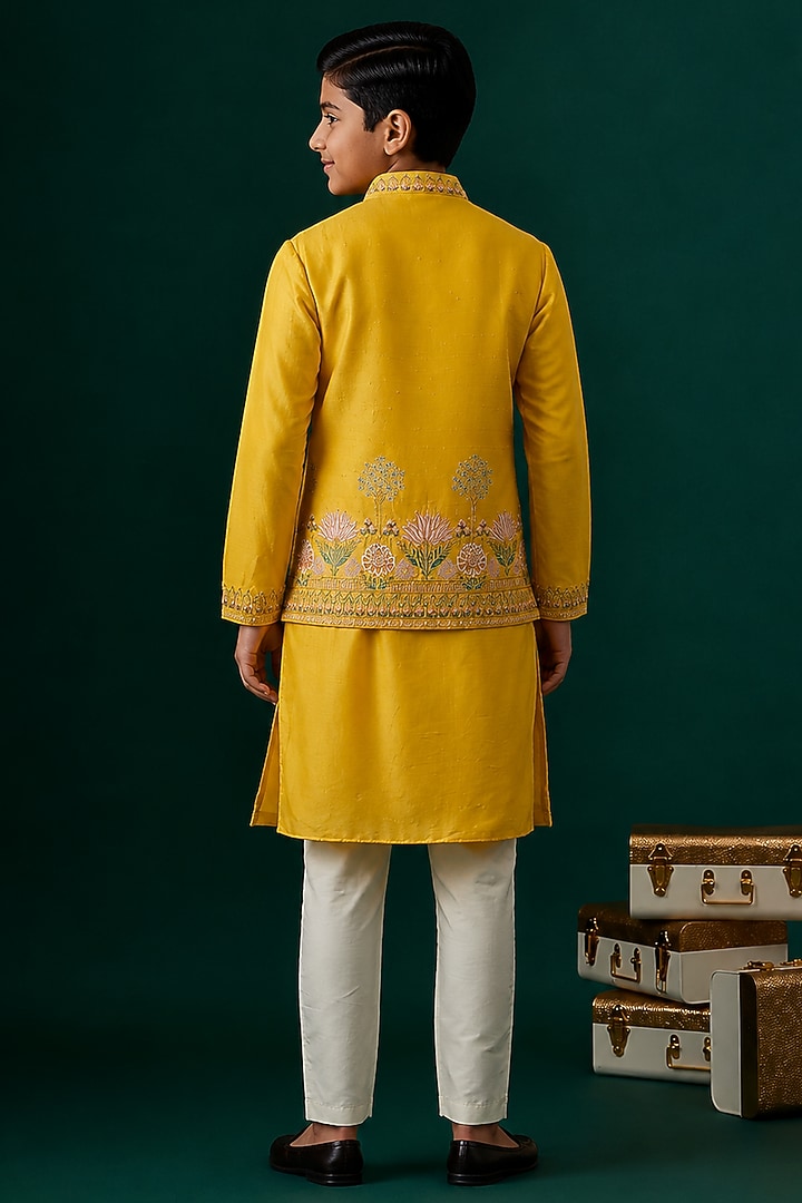 Yellow Tussar & Raw Silk Embroidered Bundi Jacket Set For Boys by Sammohan Kids at Pernia's Pop Up Shop