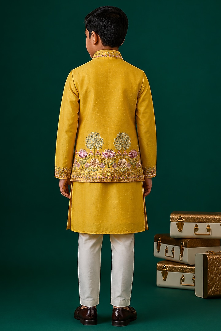 Yellow Tussar & Raw Silk Embroidered Bundi Jacket Set For Boys by Sammohan Kids at Pernia's Pop Up Shop